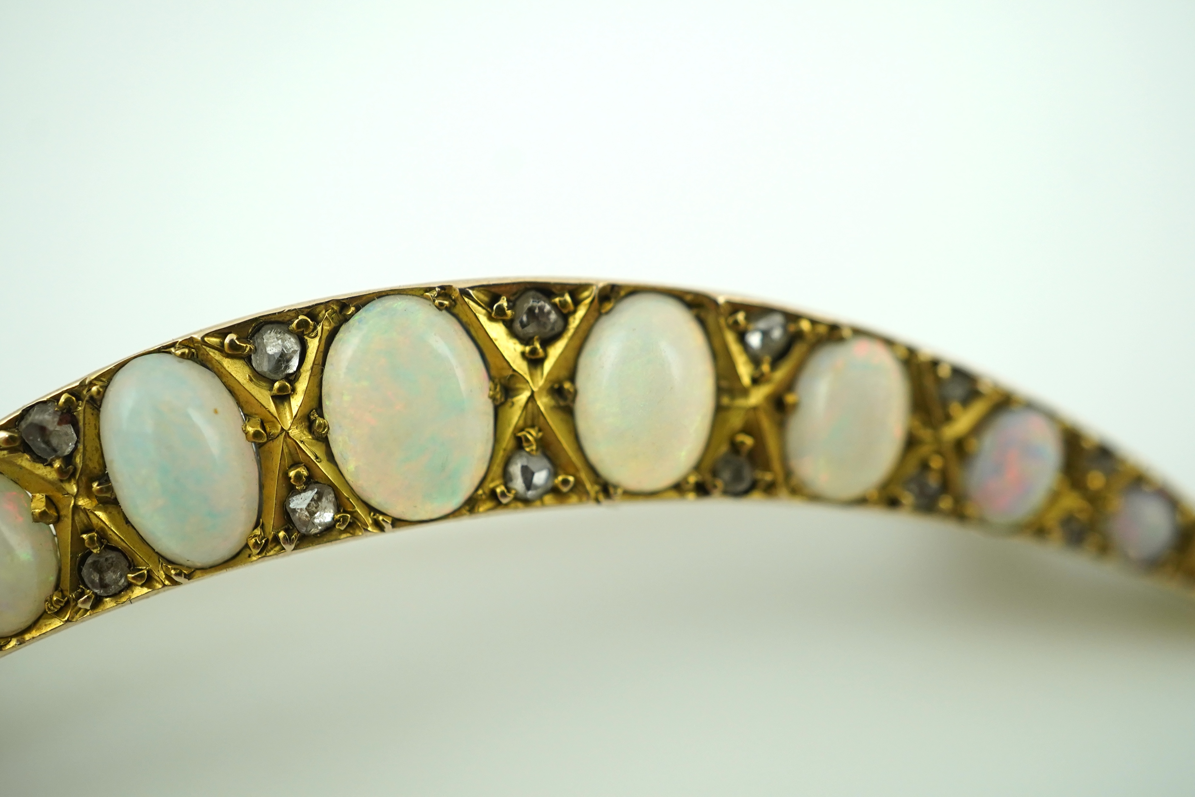 An opal and diamond brooch, early 20th century